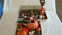 Two boxes of Christmas and Halloween decorations