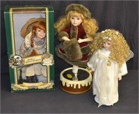 3 Various Porcelain Dolls With Stands