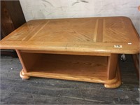 Coffee table hinged to raise higher with patterned