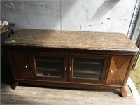 A very nice solid wood and marble topped TV stand,