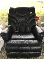 A large massage/recliner chair        (k 38)