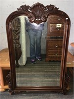 Solid mahagony, ornately carved wood frame mirror,