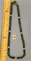 Jade and amethyst bead necklace with gold bead acc