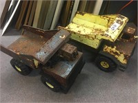 2 old metal toy trucks