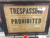 very old trespassing prohibited sign