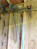garden tools on wall in shed