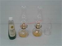 2 lamps with extra hurricane and lamp oil