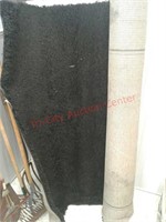 Black shag area rug approx 5 foot by 8 foot