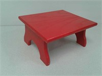 Small red wood stool