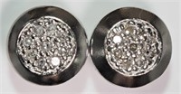 14V- Sterling silver 9 diamond stud earrings $240