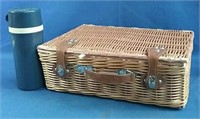 Wicker picnic basket service for four includes a