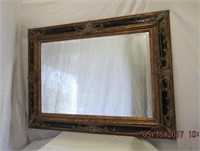 Carved framed beveled mirror 47 X 35"
