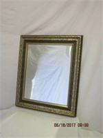 Gilt ornate wash framed beveled mirror