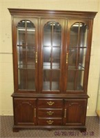 Cherry breakfront china cabinet by Strathroy with