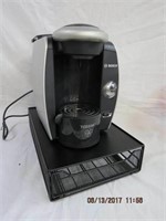 Tassimo coffee machine with pod holder