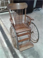 Three wheel wheelchair
