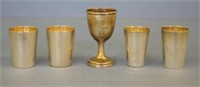 Four German 800 silver shot cups & 1 other