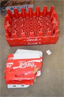 Two plastic bottle crates with 12 bottle carriers