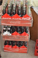 Coca-Cola three wooden crates