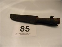Old sheath knife, wrapped handle, rusty