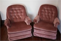 Two Rose Colored Swivel Rockers