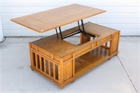 Rolling Oak Coffee Table with Lift Up Top