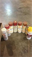 Assorted cans of spray paint