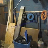 Contents of the wall- Shovel, drop cords, LP tank