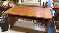 Teak wood desk with shelf underneath,