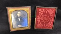 Daguerreotype in a pressed leather case of a