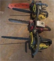 Grouping of Vintage Chain Saws
