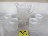 39) White Opalescent pitcher & 4 glasses;