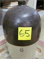 65) 6 Gal. brown/white jug (repair on spout);