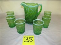 38) Moser Green Iridescent pitcher & 6 glasses;