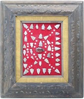 Collection of Arrowheads in Carved Wood Frame
