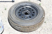 P215/70R16 Tire Mounted on a Wheel