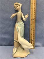 9.5" Lladro figurine of a young girl walking with