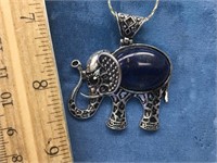 Silver alloy and lapis elephant pendant on a sterl