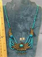 A turquoise bead and sterling silver necklace