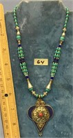 Turquoise, lapis, and coral bead necklace        (