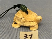 Choice on 3 (35-37): bone charm - turtle and drago