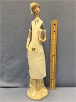 15.5" Lladro figurine of a nurse holding books