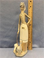 11" Lladro figurine of a woman and 2 geese
