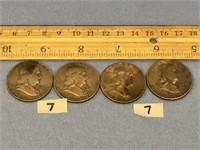 A lot with four Franklin half-dollars: 1957, 1958,