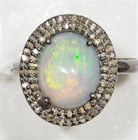 Sterling silver oval cabochon opal ring with 80