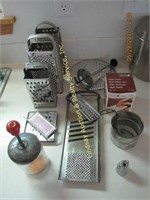 Approx 17 pcs: graters, sifters, choppers, & other