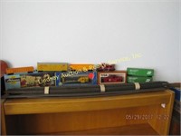 Box of miniature trains & bundle of train tracks