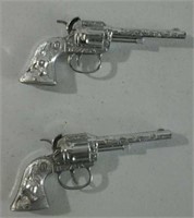 Pair small cap pistols