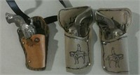 Small cap guns in holsters