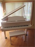 Young Chang polished white baby grand piano
